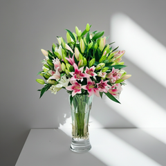 Elegant Pink and White Lily Bouquet in Glass Vase