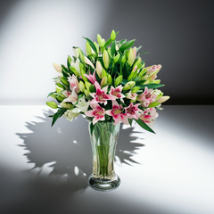 Elegant Pink and White Lily Bouquet in Glass Vase
