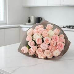 Soft Pink Bombastic Roses Wrapped in Delicate Paper