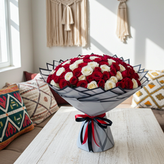 Romantic Red and White Roses in Stylish Packaging