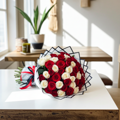 Romantic Red and White Roses in Stylish Packaging