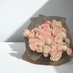 Soft Pink Bombastic Roses Wrapped in Delicate Paper