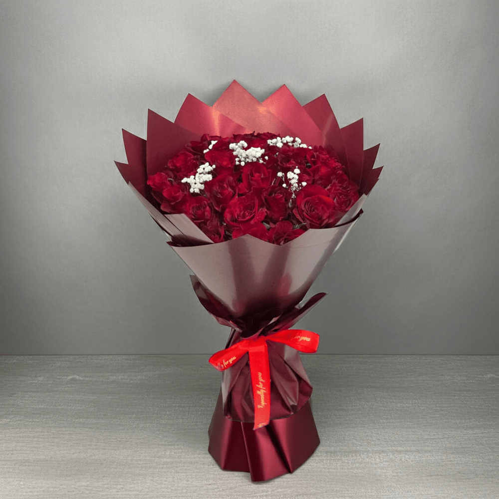 Classic Red Rose Floral Arrangement - Rawadat Al Ward