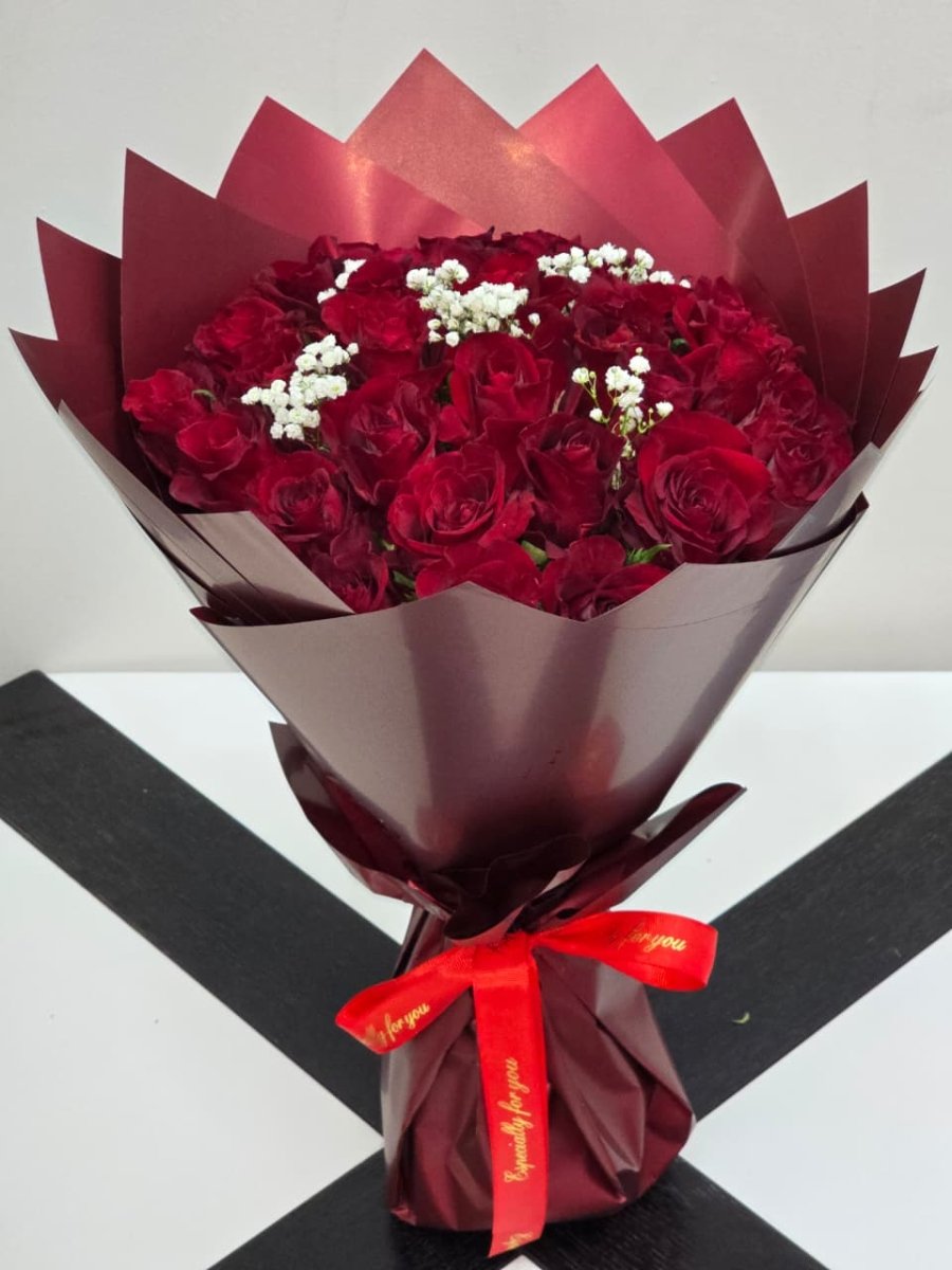 Classic Red Rose Floral Arrangement - Rawadat Al Ward