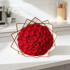 Classic Red Roses Wrapped in White Paper - Rawadat Al Ward