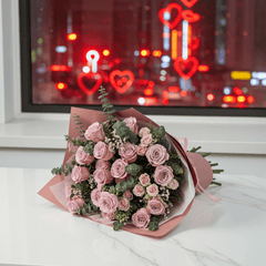 Elegant Purple Rose Bouquet with Eucalyptus - Rawadat Al Ward