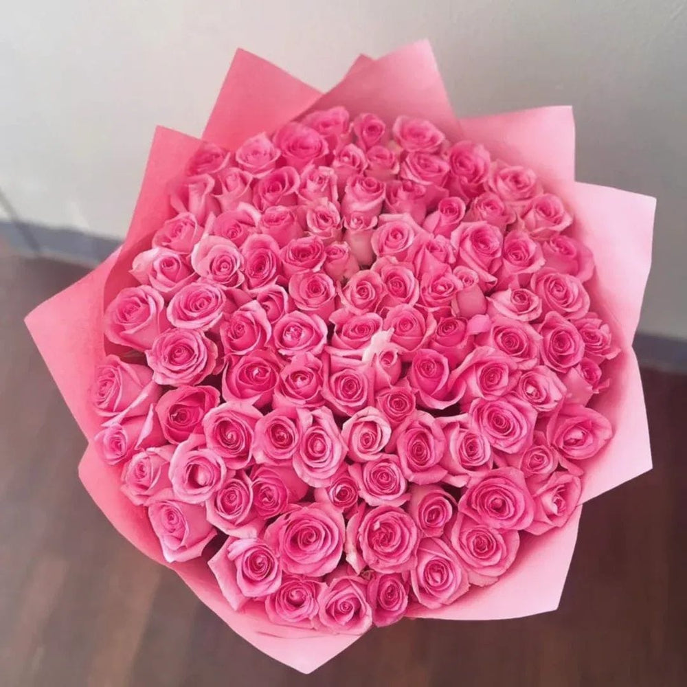 Luxury Pink Rose Bouquet in Pink Paper Wrap - Rawadat Al Ward