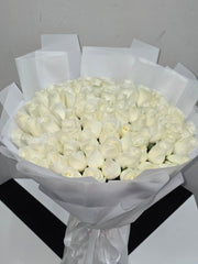 Luxury White Roses Wrapped in Paper - Rawadat Al Ward