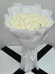 Luxury White Roses Wrapped in Paper - Rawadat Al Ward